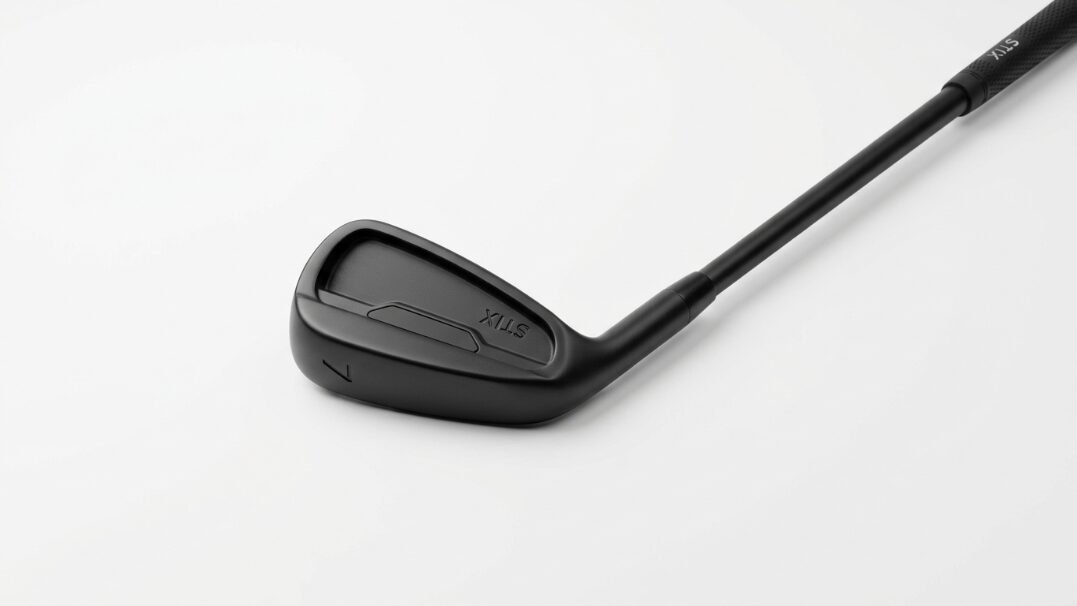 Single Stix brand seven iron golf club with a sleek black finish isolated on a white background.